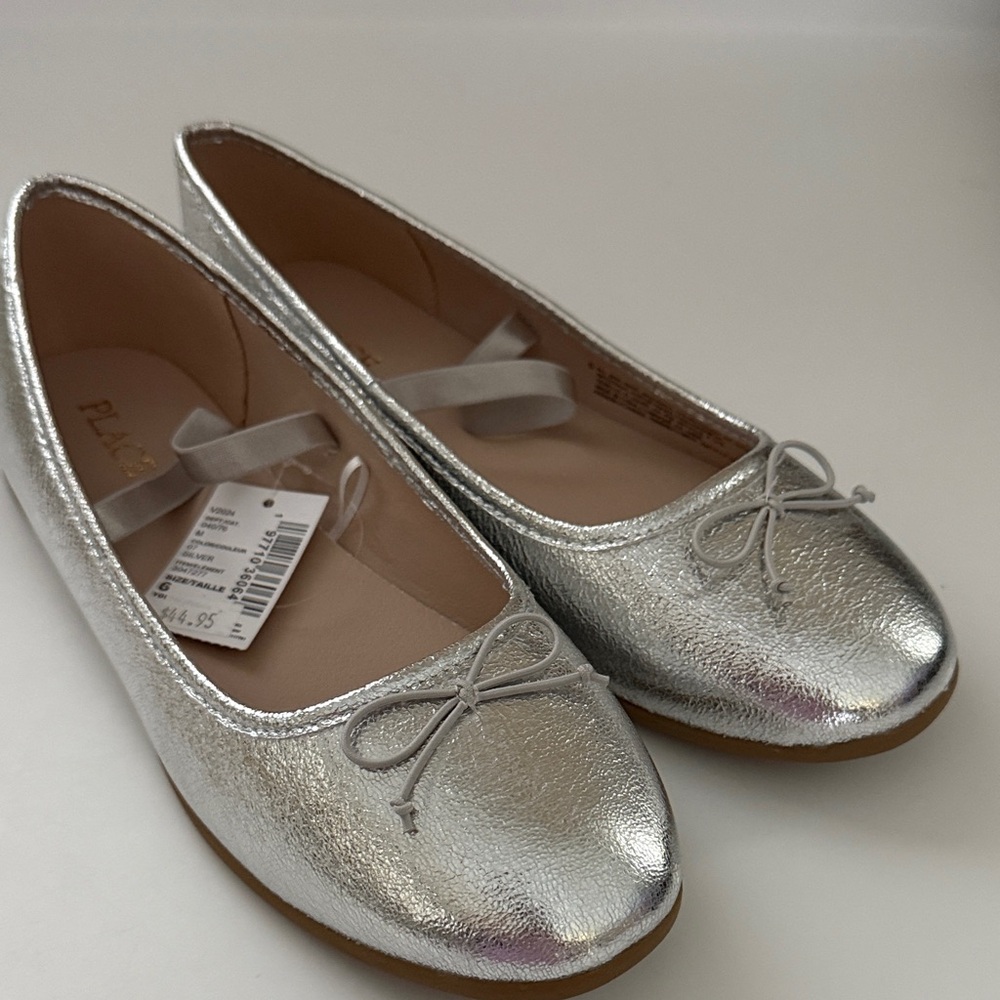 Place Metallic Silver Loafers with Bow
